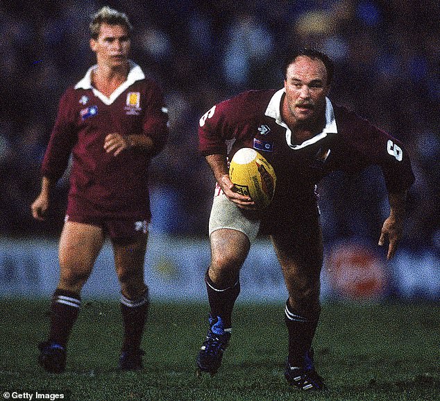 Lewis suffers from the effects of a neurodegenerative disease known as chronic traumatic encephalopathy or CTE (pictured is Wally Lewis playing for Queensland in 1990).