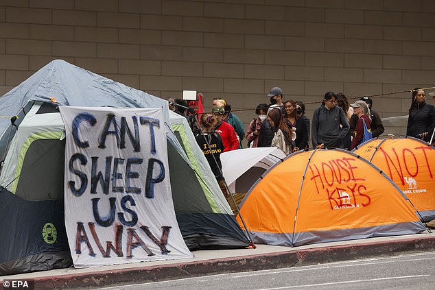 Four prominent Los Angeles academics said a no-strings-attached monthly payment of $1,000 could save the city from its rampant homelessness crisis.
