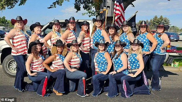 A group of volunteer dancers were told they would have to take off their American flag T-shirts because of 