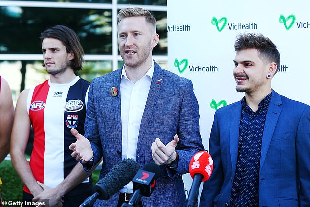 Openly gay football player turned LGBTI advocate Jason Ball (pictured middle) called Jeremy Finlayson's shocking attack 