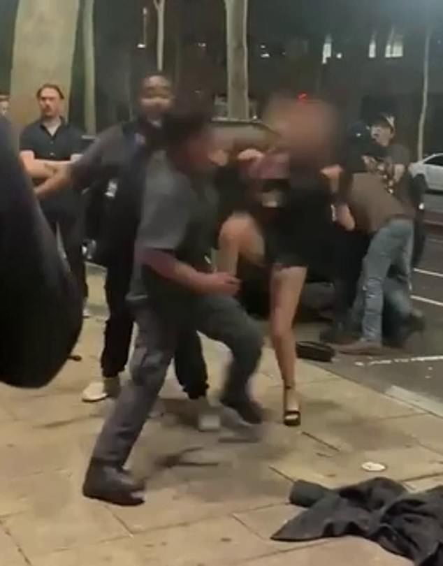 Wild footage captured a security guard punching an 18-year-old woman twice in the face outside Lamby's Tavern, Geelong, in the early hours of Sunday (pictured).