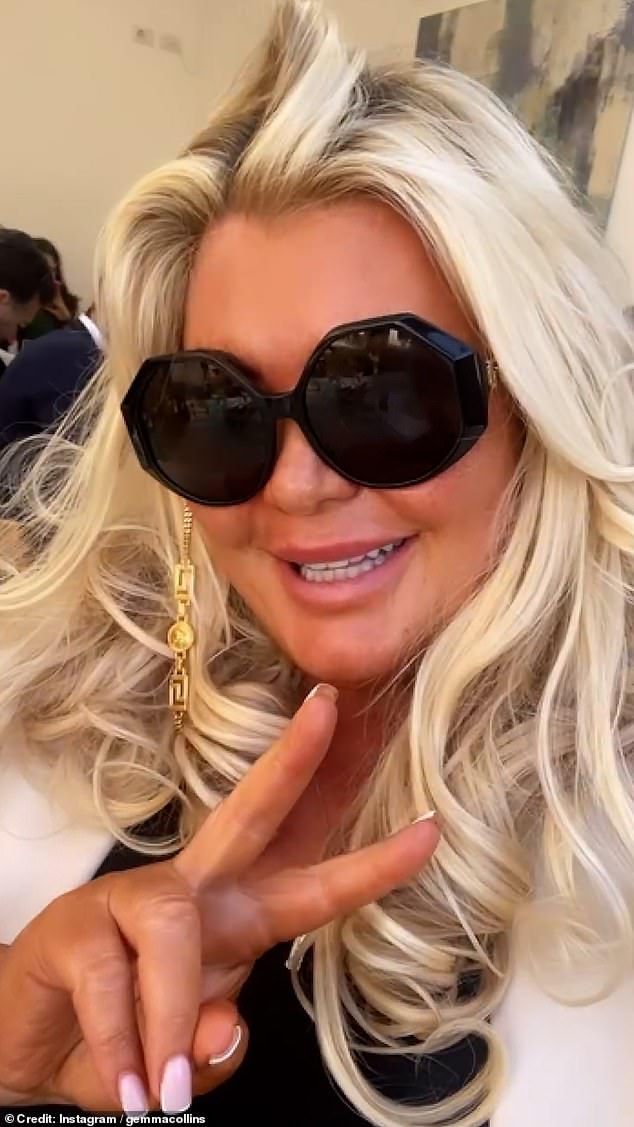 During the clip, the TOWIE icon, 43, appeared in high spirits as she filmed herself in a restaurant drinking a glass of white wine.