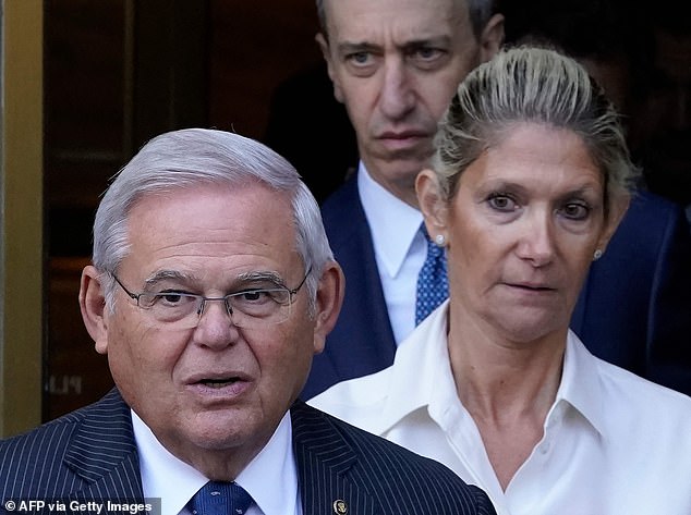 Menendez may seek exoneration in his bribery trial in May by blaming his wife Nadine (pictured right).  New court documents suggest he will say she kept him in the dark about dealings with New Jersey businessmen.
