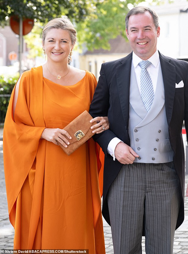 Speaking to La Libre, as reported by Point de Vue, the royal, 69, joked that he knows the exact date he plans to pass the baton to his son Guillaume, 42 (pictured with his wife in 2023). ), but 