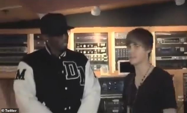 Old videos of the two-time Grammy winner (right, pictured from 2010) with Sean 'Diddy' Combs (left) have resurfaced since Homeland Security raided the rap mogul's two mansions on March 25 for a sex trafficking investigation .