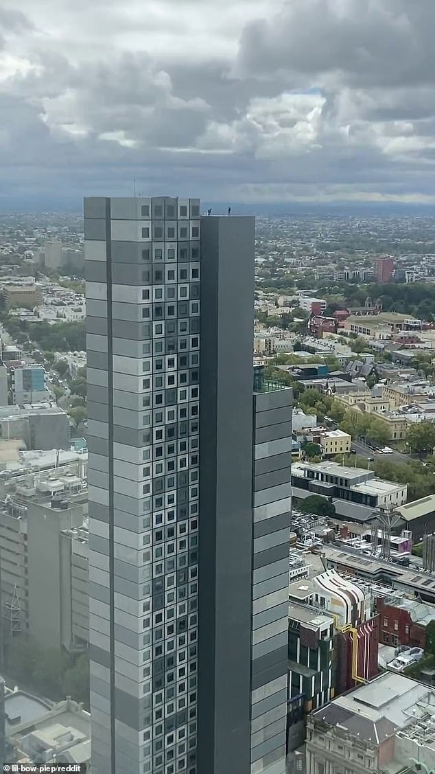 Shocked office workers spot two stupid skateboarders on top of Melbourne skyscraper