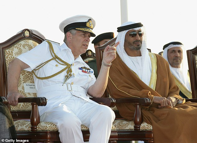 Prince Andrew (left) attending a military air show in 2010 in Abu Dhabi, United Arab Emirates