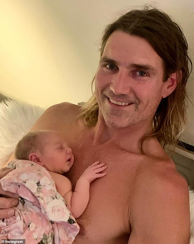 North Sydney carpenter Dan Gaut was excited about the impending birth until his pregnant girlfriend Liv suddenly returned to the US without him (pictured, meeting daughter Ana).