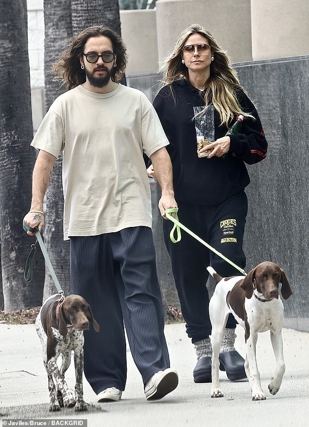 Haidi Klum, 50, and her husband Tom Kaulitz, 34, went dog walking with their two German shorthaired pointers after a lunch stop in the Studio City neighborhood of Los Angeles.