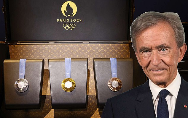 Influence: Bernard Arnault, head of LVMH, the richest man in the world, with Olympic Games medals