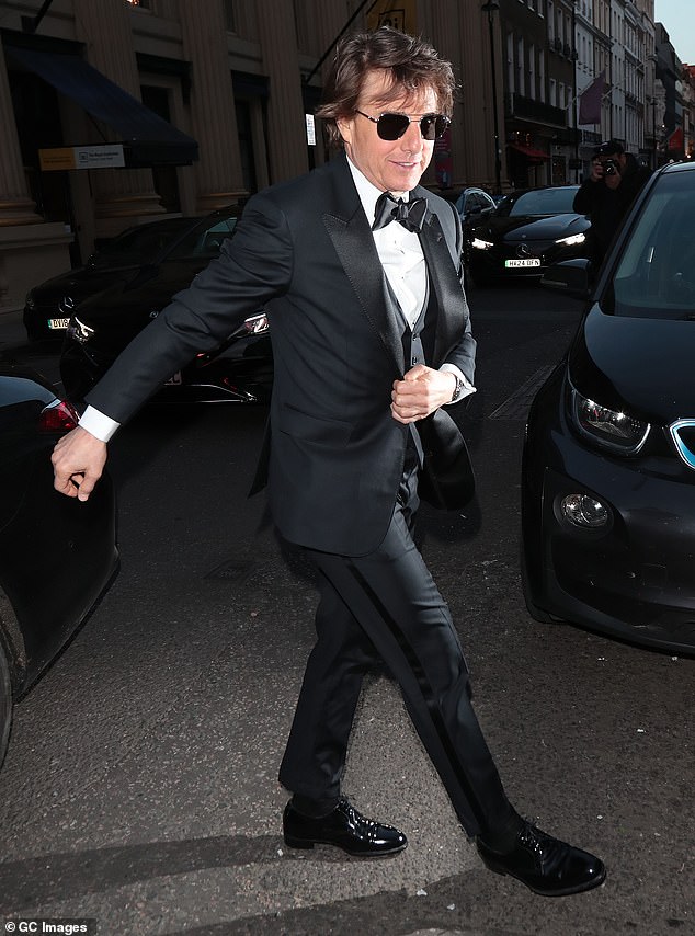 Tom Cruise, 61, arrives at Oswald's, Mayfair, for Victoria Beckham's 50th birthday party on Saturday.
