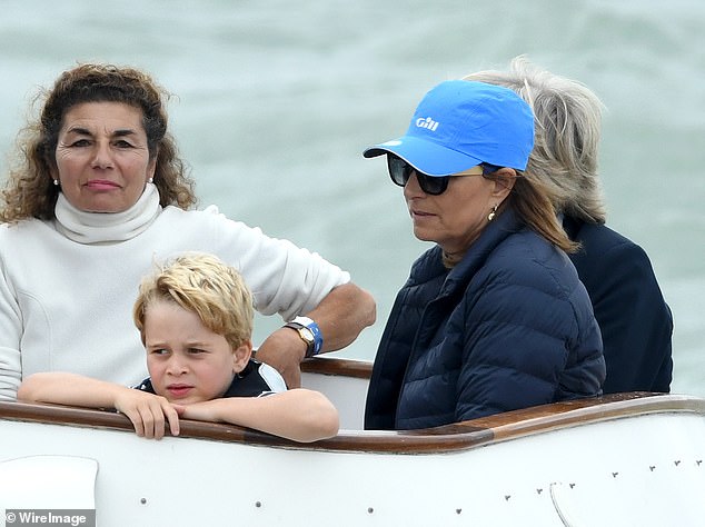 Carole, right, looking after her grandson Prince George at the King's Cup Regatta in Cowes in 2019.