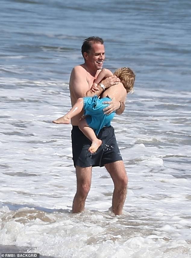 DailyMail.com spotted Hunter Biden enjoying the shores of Malibu with his four-year-old son Beau Jr on Tuesday.