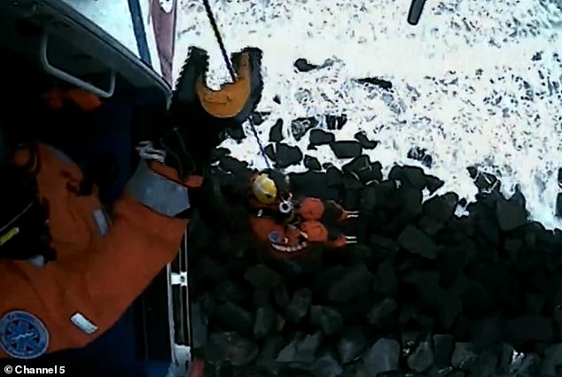 The series shows coast guard personnel coming to Julia's aid after she became trapped on rocks.