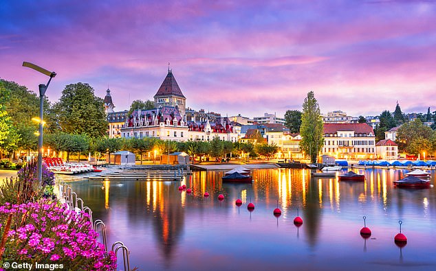 Splendor: Jane Keightley travels to Lausanne, Switzerland to learn more about its Olympic history.  Above, the view from the Promenade d'Ouchy over Lake Geneva