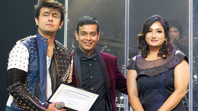 A photo showed Amit Sharma and his wife Nikita posing with popular Bollywood singer Sonu Nigam (left), who has 2.4 million followers on Instagram, at one of his concerts in Sydney in 2019.