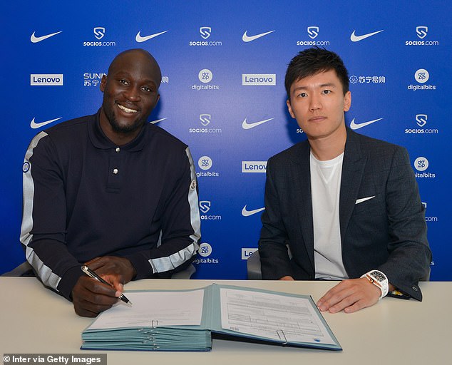 Last season, the club reportedly recorded losses of around £120m (pictured: former Inter star Romelu Lukaku, left, and club boss Steven Zhang, right).