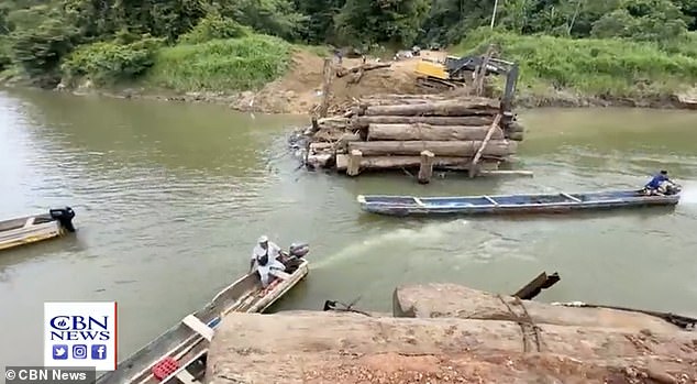 A massive bridge said to be big enough for a column of tanks to cross will rise in Panama, at one of the most dangerous migrant crossing points in the world.  Pictured: A video showing the early stages of the bridge's construction is seen on CBN footage.
