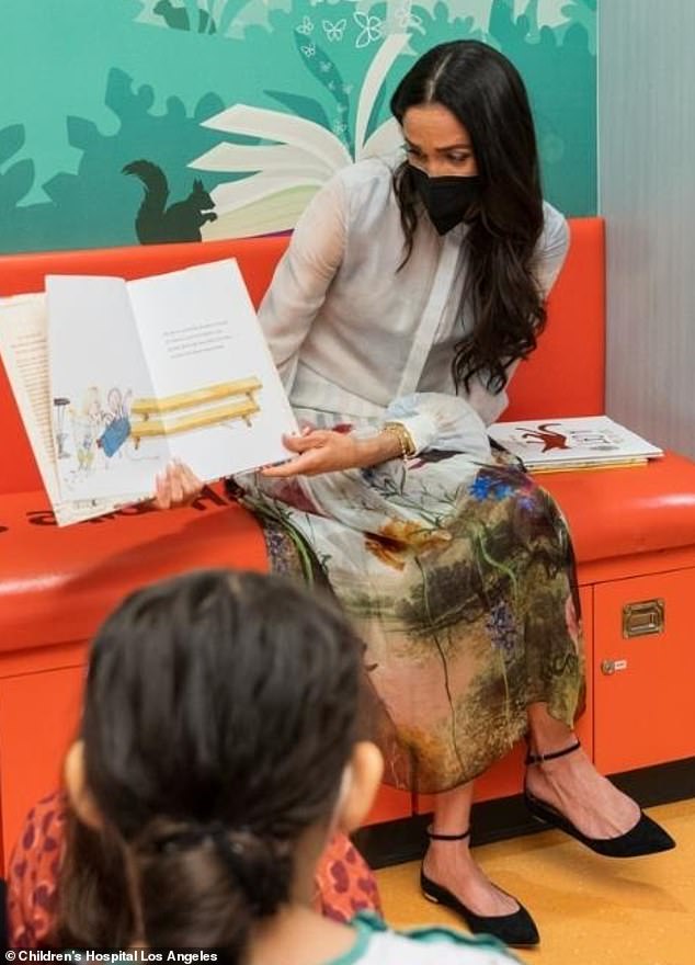 Meghan sat and read to children yesterday while visiting Children's Hospital Los Angeles.