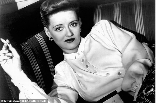 With a cigarette, Jenni imagined herself as fiery big screen icon Bette Davis (above)