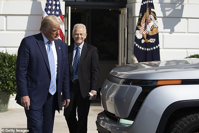 Navarro was a trade adviser to President Donald Trump.  They are seen together in 2020 examining an all-electric van on the South Lawn of the White House.