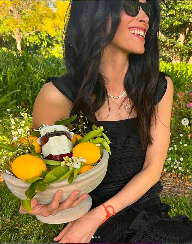 Meghan's Suit co-star Abigail Spencer covered herself in a jar of the Duchess's strawberry jam for a fawning outdoor photoshoot in an Instagram post.
