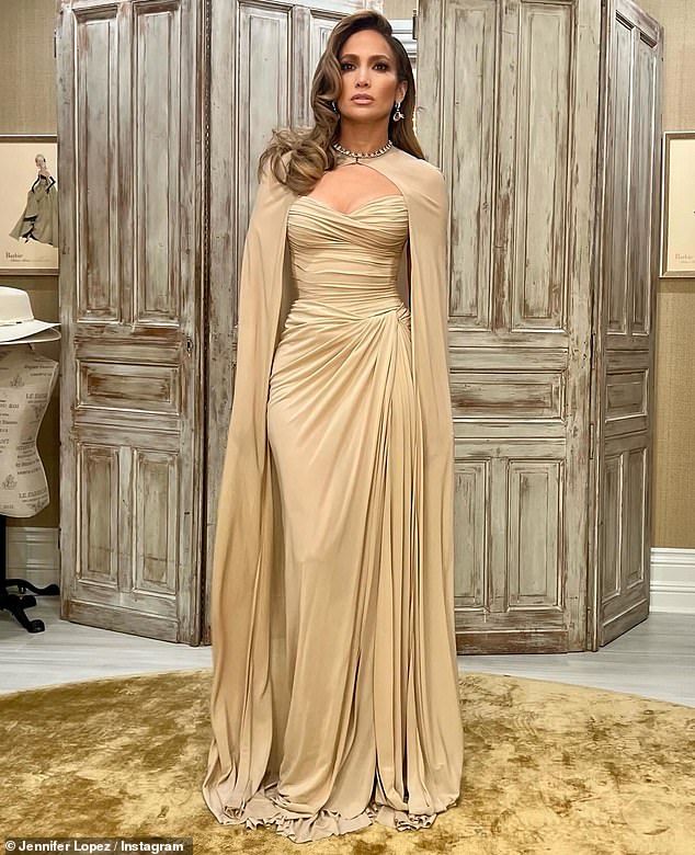 Jennifer Lopez cut an elegant figure in a pale gold dress on Thursday while attending the Hispanic Federation's 2024 annual gala.