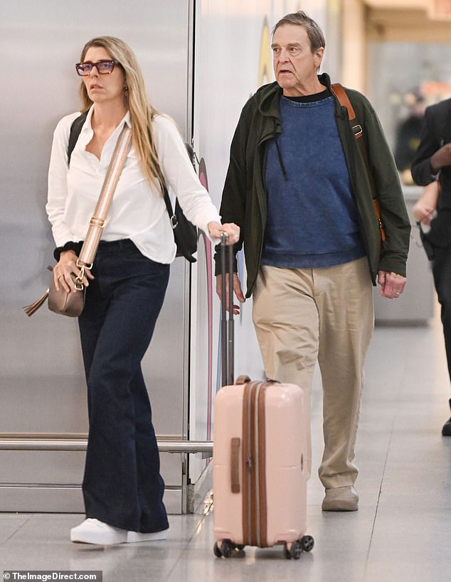 John Goodman showed off his 200-pound weight loss when he arrived at John F. Kennedy Airport in New York with his wife Anna Beth this week.