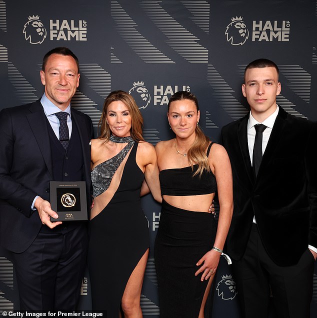 John Terry was pictured celebrating his induction into the Premier League Hall of Fame with his wife Toni, daughter Summer and son Georgie (pictured left to right).