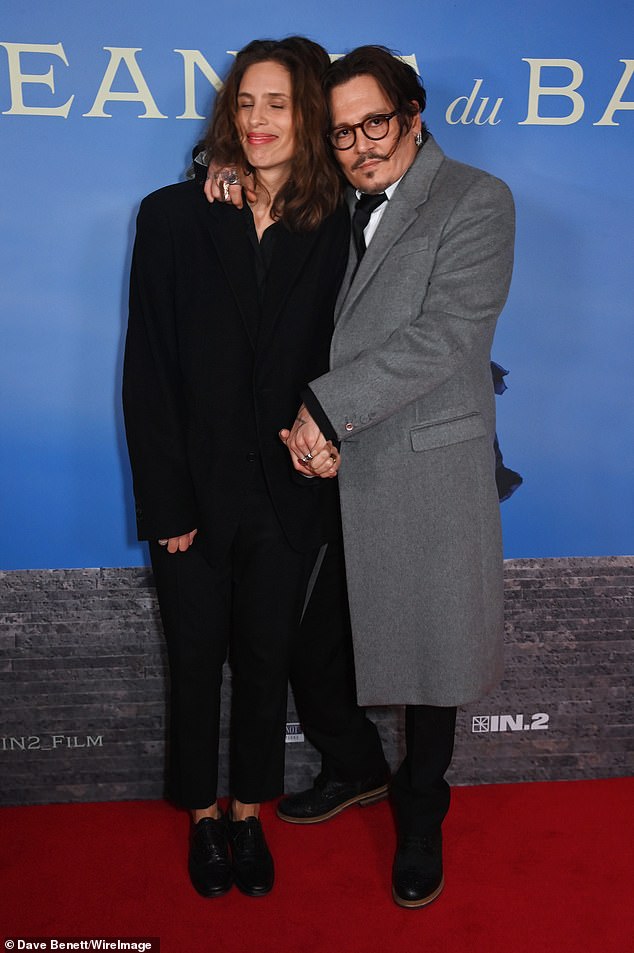 Johnny Depp hugged his Jeanne du Barry co-star Maiwenn while attending the British premiere of the period drama in London on Sunday.