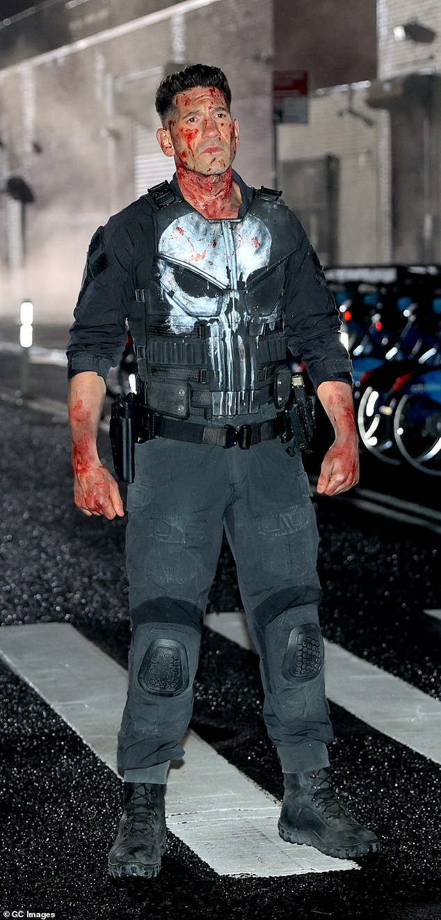 Jon Bernthal, 47, was seen covered in blood in Brooklyn on Tuesday while playing the character of The Punisher for the upcoming series Daredevil: Born Again.