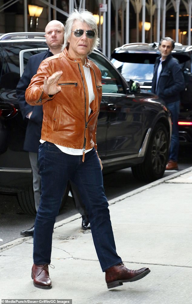 Jon Bon Jovi rocked a brown biker jacket as he entered the Times Square studios in Midtown Manhattan on Thursday to film ABC's Good Morning America.