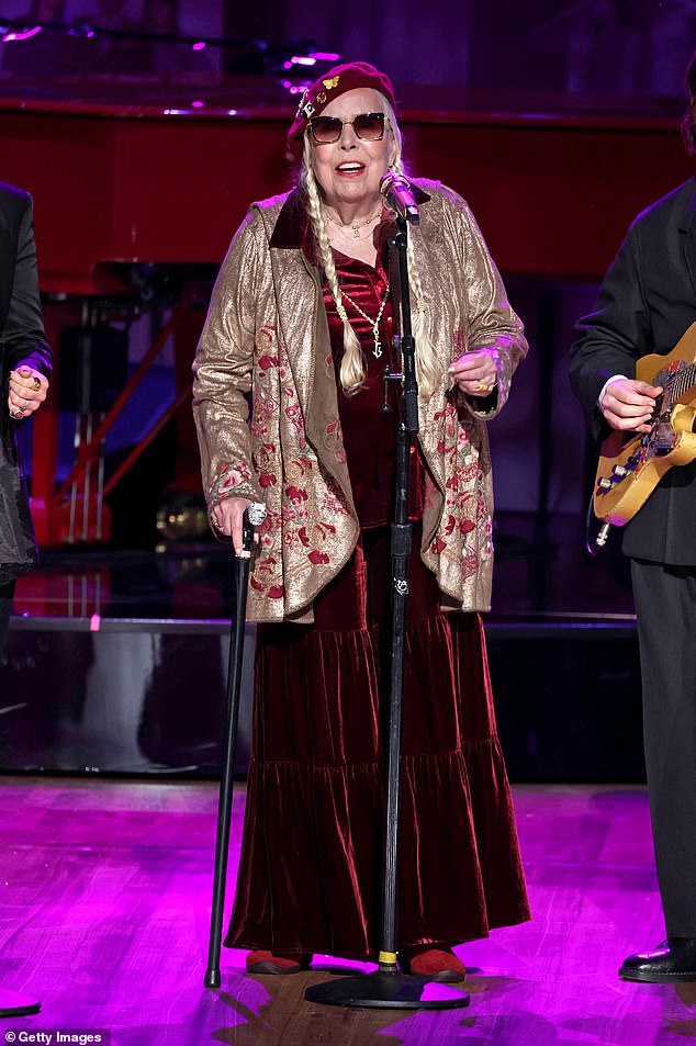 Joni Mitchell, 80, performed a cover of Elton John's I'm Still Standing as the iconic musician was honored with the Gershwin Award in Washington DC.