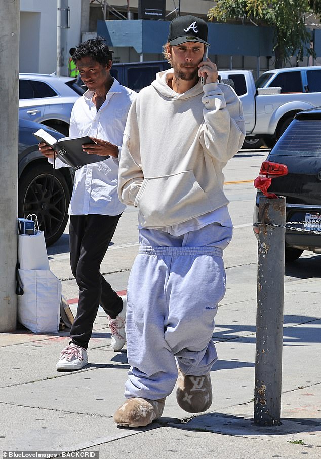 Justin Bieber stepped out in low-rise Balenciaga sweatpants and a hoodie while grabbing lunch on Wednesday.