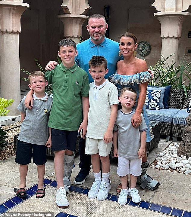 Taking to Instagram on Monday, 14-year-old Kai shared a snap of the clothing brand Drama Call had sent him;  However, a large blown-up version of Coleen's Vogue cover was visible behind the couch (pictured, Wayne and Coleen with Kai, Klay, 10, Kit, eight, and Cass, six)