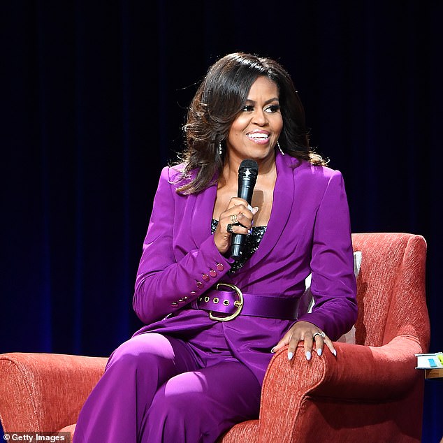 During the interview, he also revealed which celebrity he and Bianca would have a threesome with: Michelle Obama (Obama pictured in 2019).