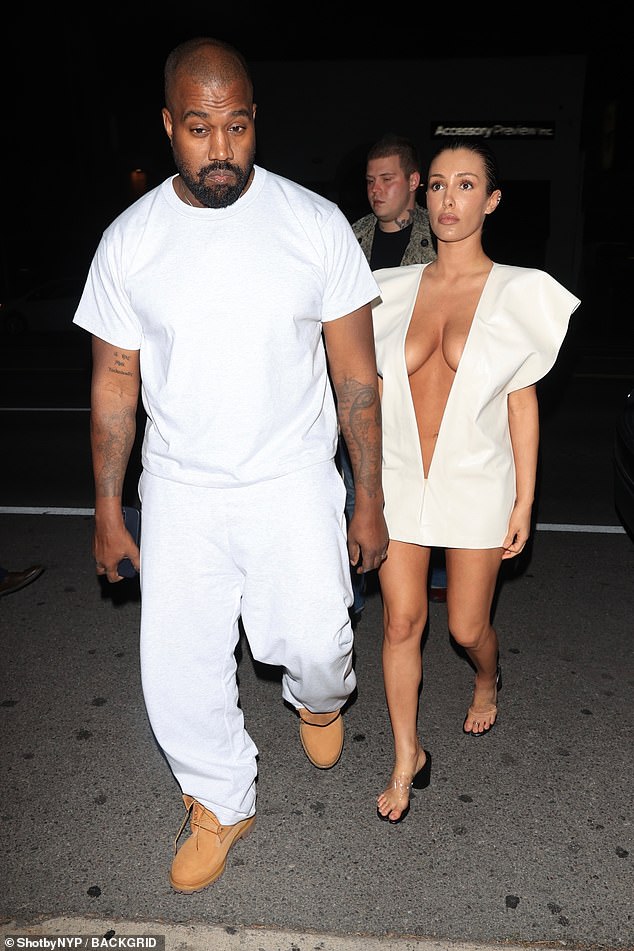 Kanye West's wife Bianca Censori used her ex Kim Kardashian as style inspiration once again when she stepped out in a white dress previously worn by the star.