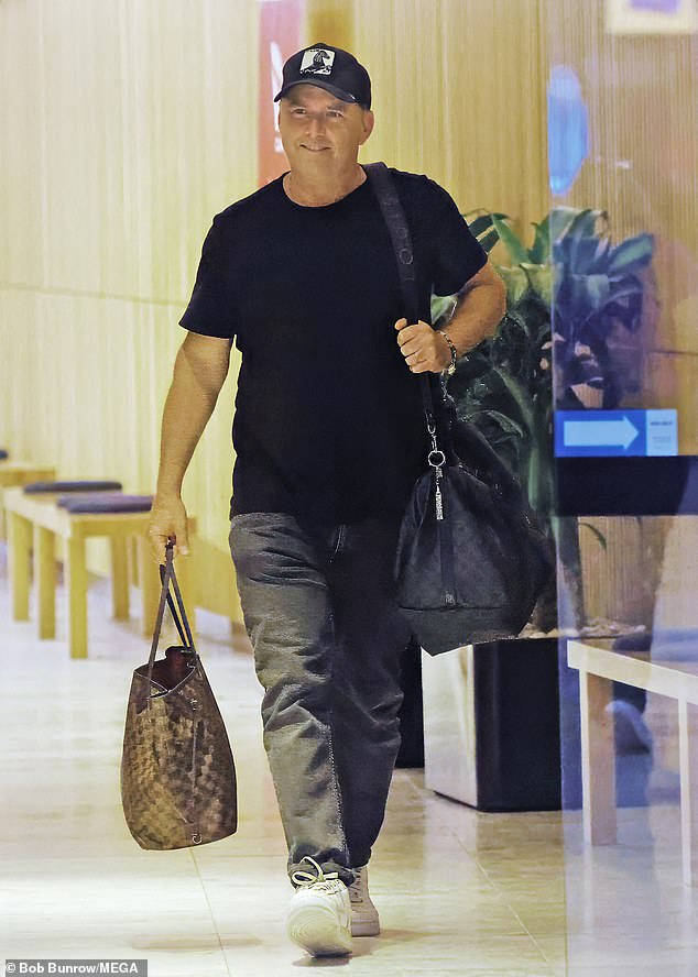 Karl Stefanovic seemed to be in good spirits as he jetted off on a family getaway with wife Jasmine Yarbrough and daughter Harper on Friday.