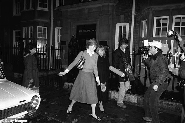 Lady Diana Spencer, as she then was, walking past television cameras waiting outside her Coleherne Court flat in November 1980.