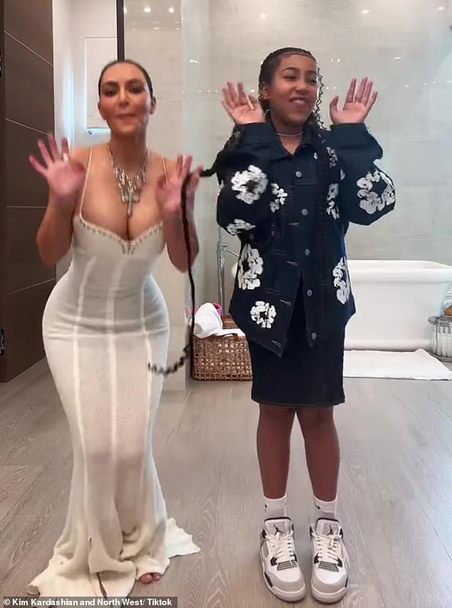 The 43-year-old mogul, whose mother Kris Jenner, 68, hosted a party, modeled a sexy white dress with a plunging, studded neckline in a short TikTok video.