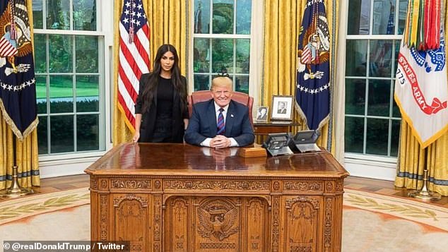 Kim Kardashian (left) poses with former President Donald Trump (right) in the Oval Office on May 30, 2018. Kardashian's first visit to Trump was to ask him to pardon Alice Johnson.
