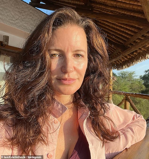 Kristin Davis looked a natural beauty in a makeup-free selfie shared to Instagram on Tuesday while vacationing in Kenya.  'The jet lag, but Kenya's hair is worth it.  #throwback,' he captioned the post.