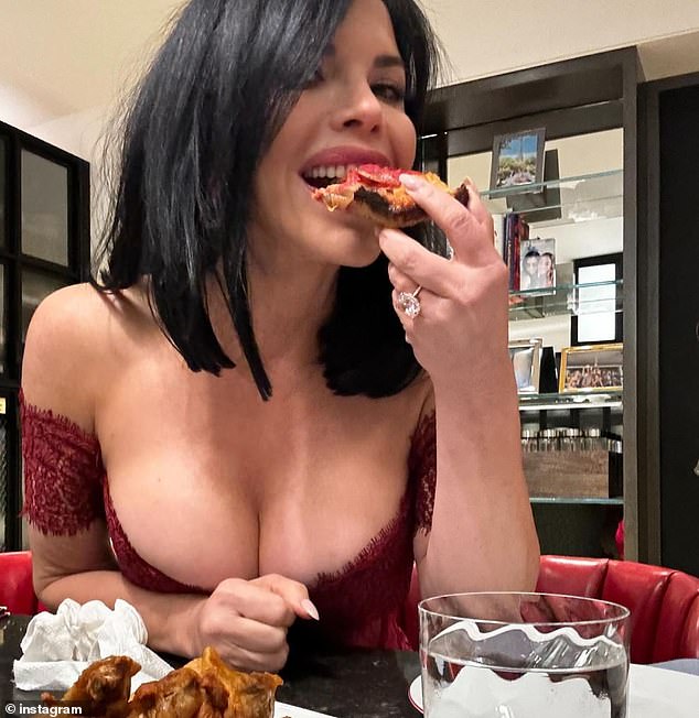 He also posted a photo from the end of the night, in which he appears enjoying a slice of pizza; As she leaned toward the camera, her busty chest nearly popped out of her racy dress.