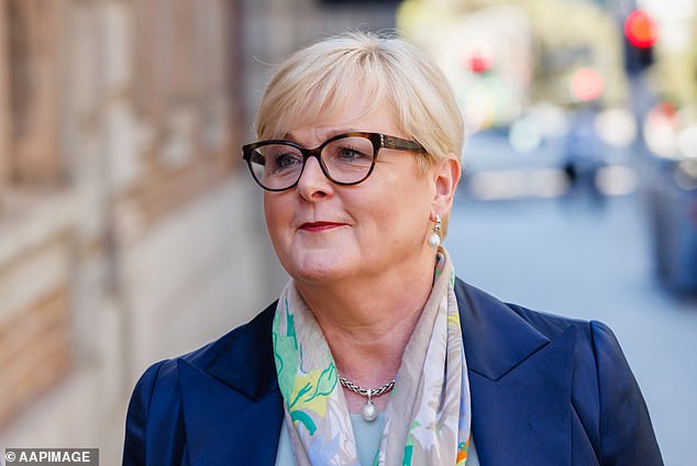 Former Coalition minister Linda Reynolds (pictured) has revealed she will continue her own defamation proceedings against her former employee Brittany Higgins and Ms Higgins' partner David Sharaz.