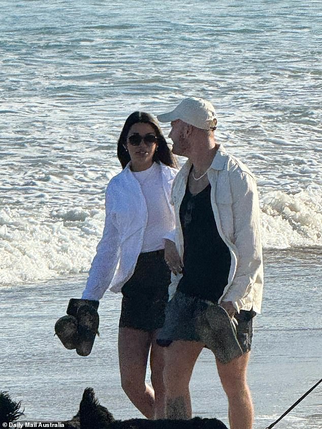 Married At First Sight boyfriend Tim Calwell is not heartbroken following his split from TV girlfriend Sara Mesa.  The Gold Coast business owner, 31, was spotted enjoying a romantic beach walk with his new Brazilian girlfriend Barbara on a Gold Coast beach this weekend.