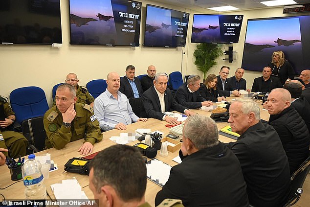Israel's Prime Minister Benjamin Netanyahu (center) during a war cabinet meeting in Kirya, Tel Aviv.