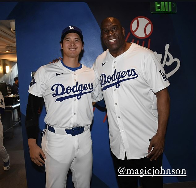 Shohei Ohtani and Magic Johnson posed for a photo at the Dodgers game on Monday night.