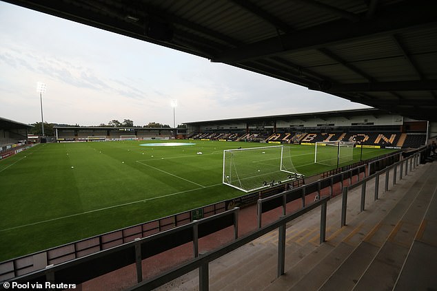 Masked thieves broke into Burton Albion's Pirelli stadium on Sunday night and stole players' equipment and valuables.