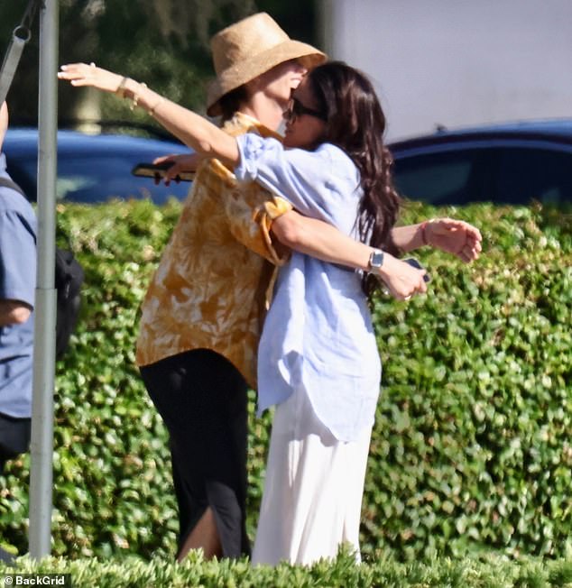 Meghan Markle was seen hugging a woman believed to be Delfina Blaquier during a Netflix session in Palm Beach yesterday.
