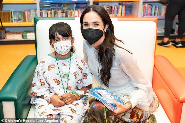 Meghan Markle gave signed Polaroid photographs to children during her visit to a Los Angeles children's hospital, new photos show.